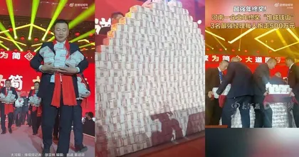 เจ้าของบริษัทชาวจีนแจกโบนัสพนักงานกว่า 200 ล้านบาท และให้หยิบจากกองธนบัตรกันเอง